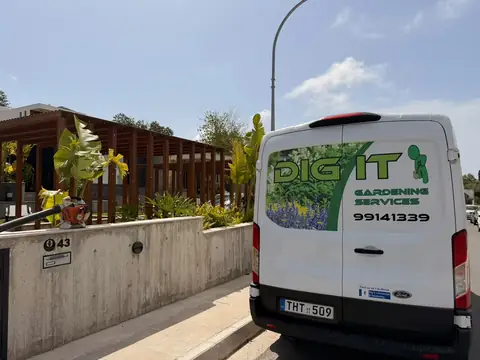 A van outside a client's gate