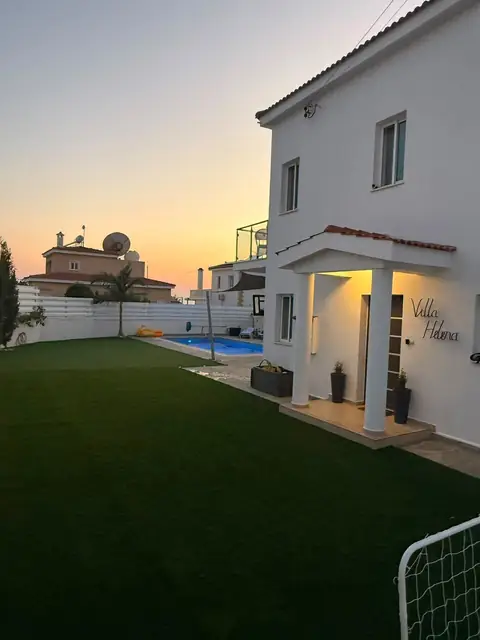 Villa lawn and pool, ready for the owners