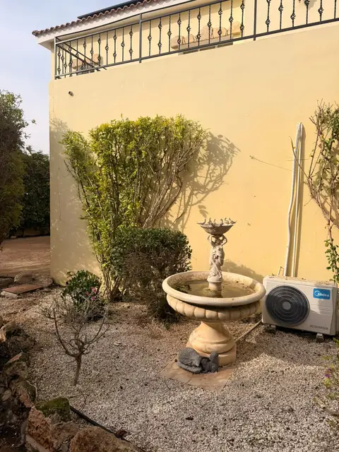 A fountain garden tidied and cleared